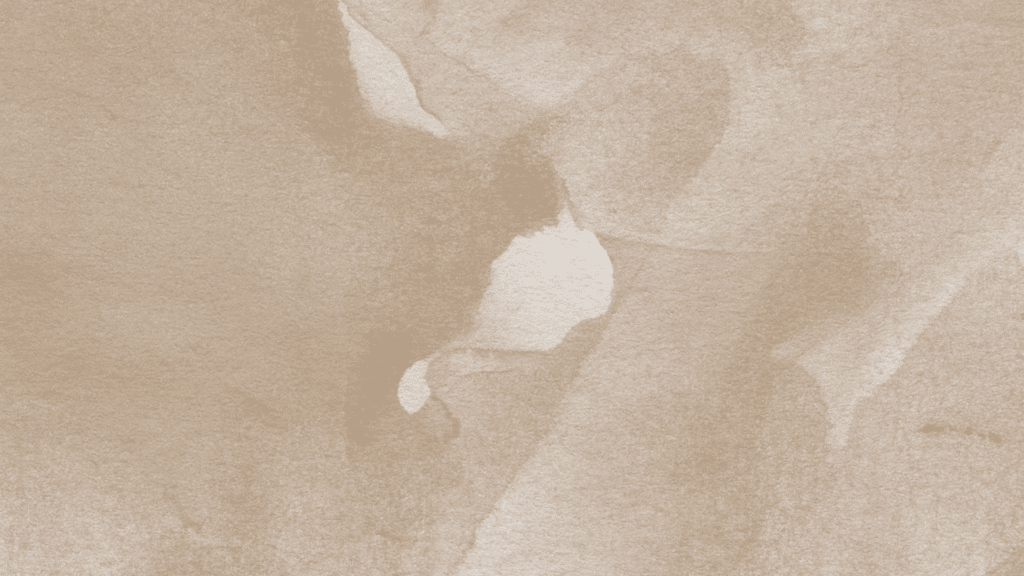 Fond texturé beige sable avec ombres douces de feuilles – Le 2080 Fit Club Haute-Savoie